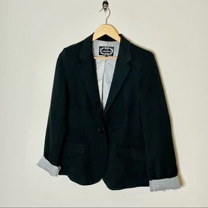 Black blazer with button.